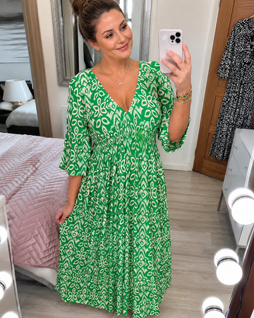 Yvonne - Elegancka sukienka z falbanami